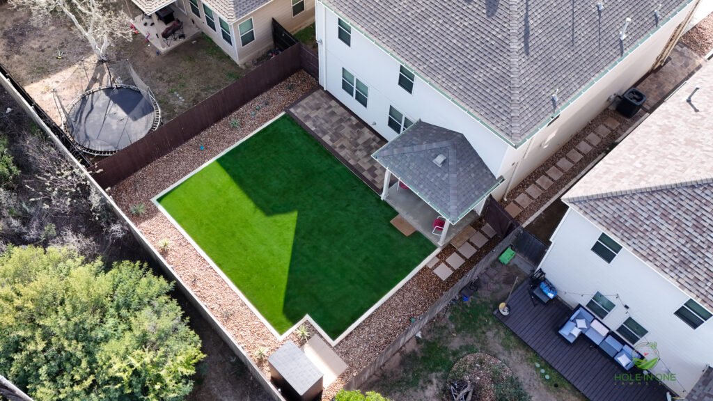 Aerial view of backyard synthetic putting green