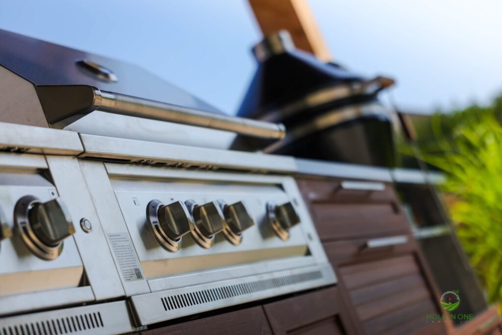 Outdoor kitchen grill in backyard