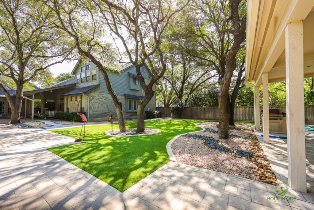 Backyard synthetic turf golf net setup