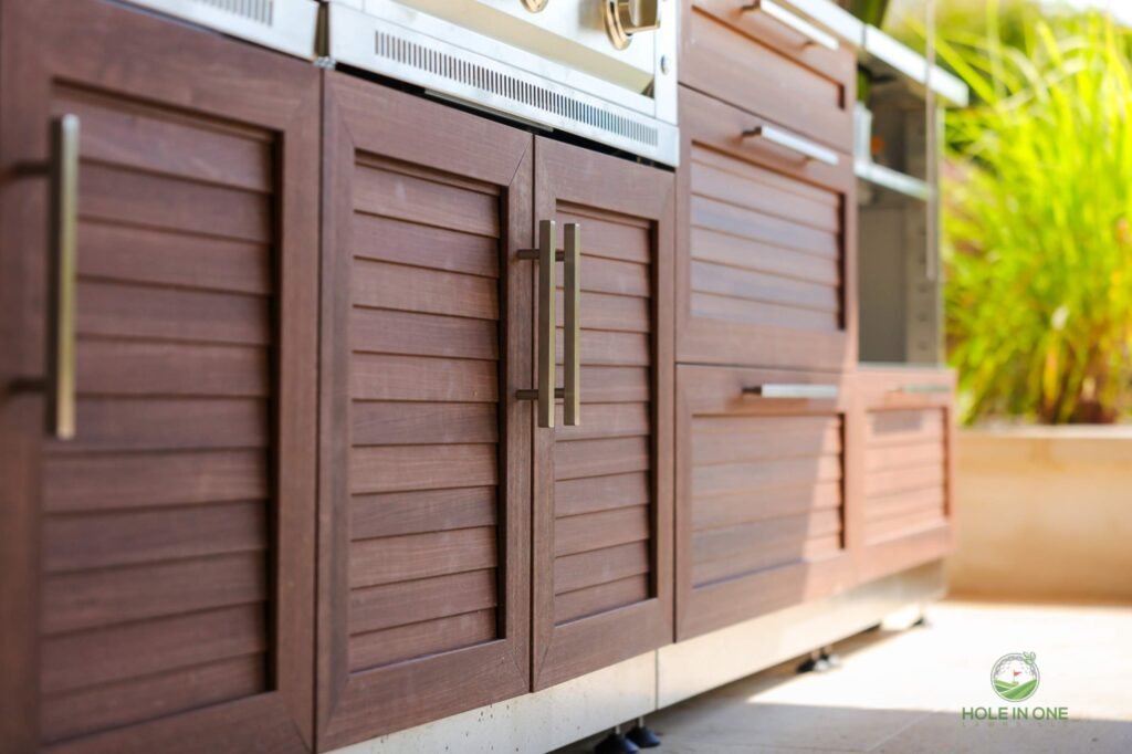 Outdoor kitchen cabinets and storage